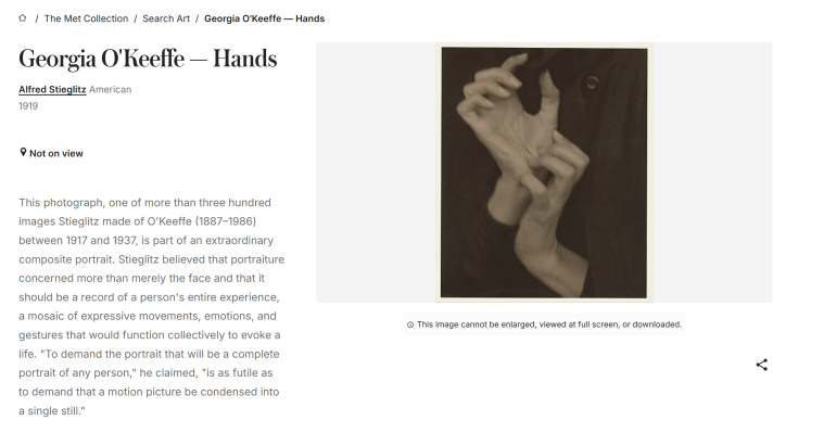 Sepia-toned photograph of two hands interlaced, fingers splayed expressively against a dark background.